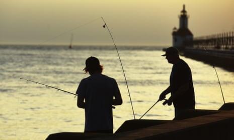 invōk.io petition & crowdfunding social platform - Two men fishing on a pier at sunset collaborate using the invōk.io crowdfunding social platform.