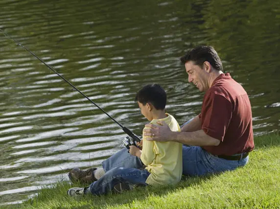 invōk.io petition & crowdfunding social platform - A father and son fishing in a pond