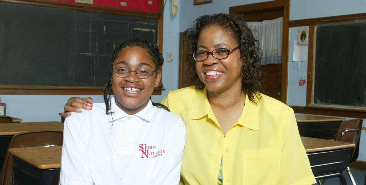 invōk.io petition & crowdfunding social platform - A woman in glasses smiles with a young girl in a classroom while using the invōk.io social platform.|invōk.io petition & crowdfunding social platform - A woman utilizing the invōk.io platform to crowdfund her metal machine project.|invōk.io petition & crowdfunding social platform - A woman soliciting signatures for an invōk.io petition in front of the Supreme Court.|invōk.io petition & crowdfunding social platform - A group of people using the invōk.io petition platform are standing in front of the Supreme Court.|invōk.io petition & crowdfunding social platform - A man in a suit and tie discusses the invōk.io petition and crowdfunding social platform with reporters outside the supreme court.|invōk.io petition & crowdfunding social platform - A man in a pink shirt advocating for a cause on the invōk.io petition platform.|invōk.io petition & crowdfunding social platform - A couple participating in a photoshoot on the invōk.io platform.|invōk.io petition & crowdfunding social platform - Three women utilizing the invōk.io social platform while sitting at a desk in a classroom.|invōk.io petition & crowdfunding social platform - A man holding an invōk.io petition stands in front of the supreme court building.|invōk.io petition & crowdfunding social platform - Three people using the invōk.io crowdfunding social platform for a picture in a classroom.