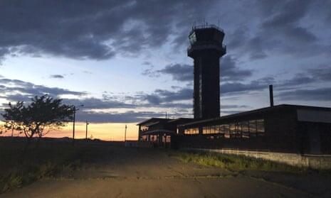 invōk.io petition & crowdfunding social platform - An invōk.io crowdfunding campaign to build an airport tower at dusk with a cloudy sky.