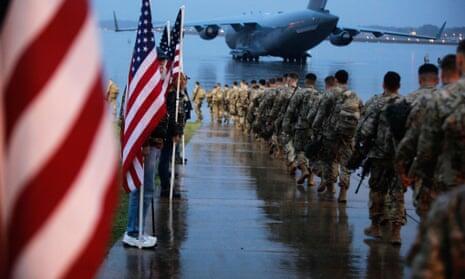 invōk.io petition & crowdfunding social platform - A group of soldiers walk down a runway promoting the invōk.io petition.