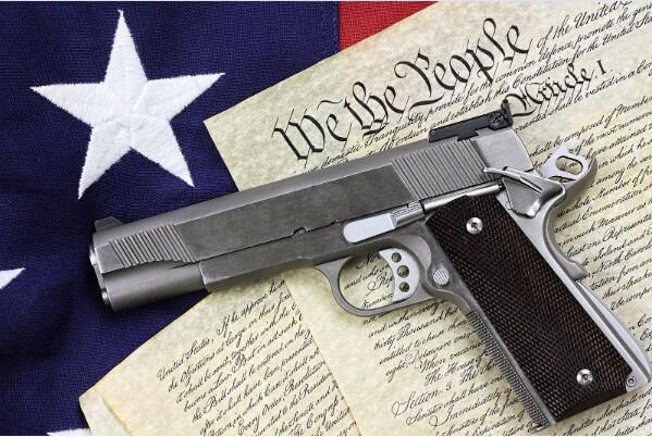 invōk.io petition & crowdfunding social platform - A crowdfunding social platform featuring an invōk.io petition with a gun on top of an American flag greeting card.