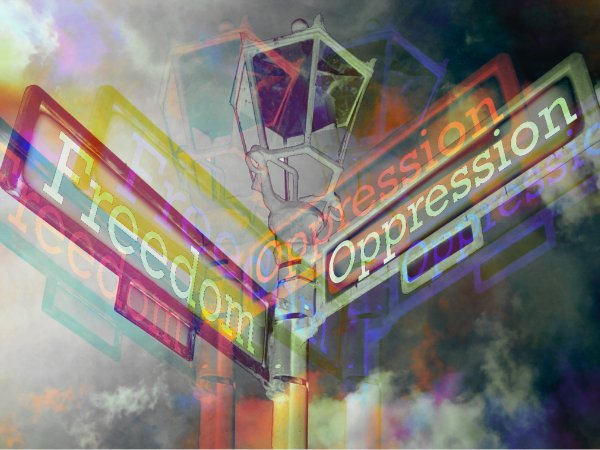 invōk.io petition & crowdfunding social platform - A street sign visually represents the concepts of freedom and oppression
