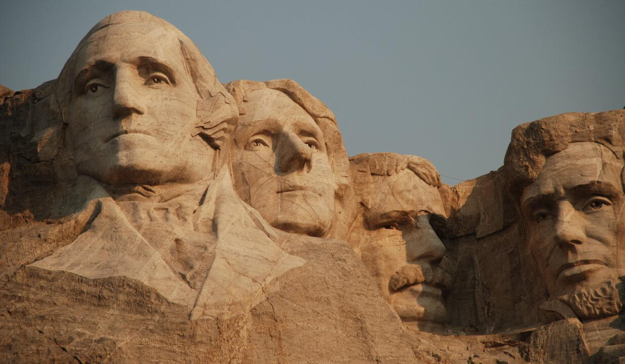 invōk.io petition & crowdfunding social platform - The faces of presidents are carved into a rock as part of an invōk.io crowdfunding campaign.