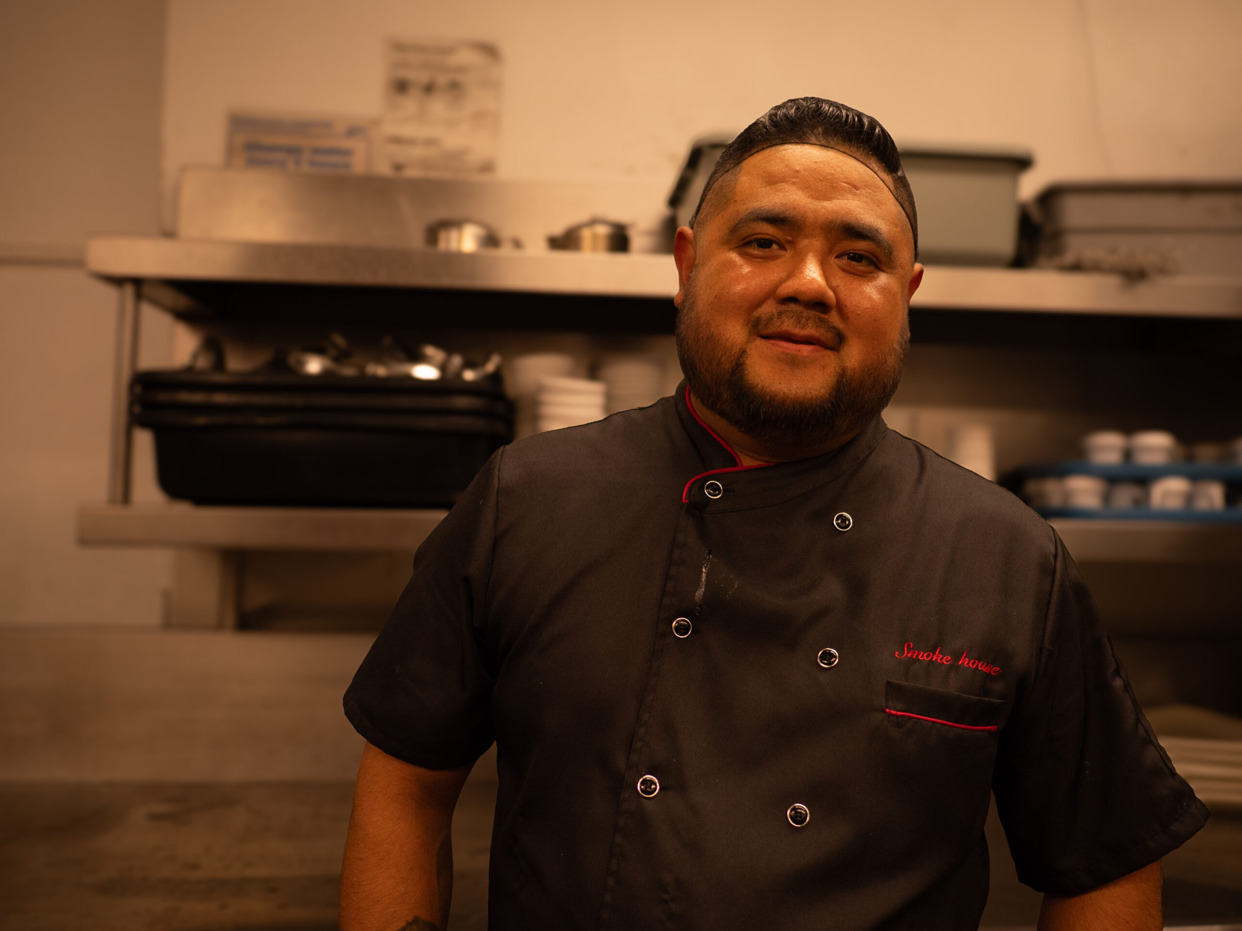 These Nine L.A. Dishwashers Are the Real Heroes of Your Favorite Restaurants 7 a man in a black uniform in a restaurant's kitchen