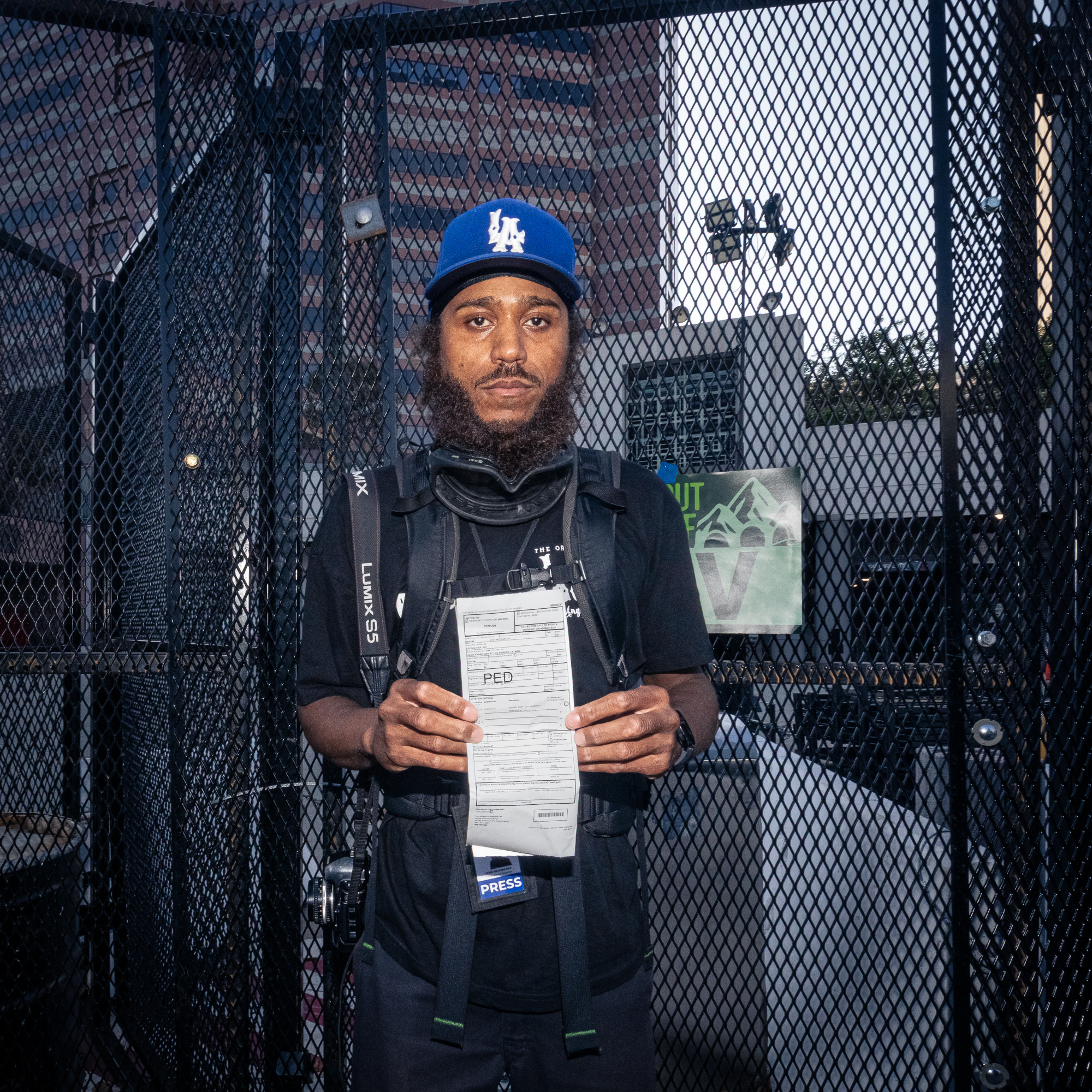 Investigations Newsletter: L.A. TACO Reporter Detained While Reporting (Again) 2 Journalist holds citation facing camera.