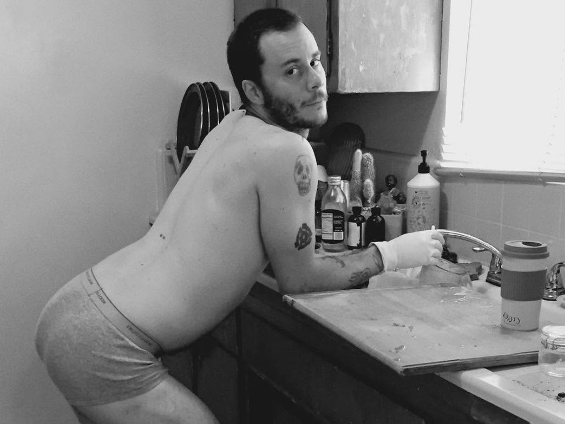 These Nine L.A. Dishwashers Are the Real Heroes of Your Favorite Restaurants 12 a person in only underwear leans over a sink